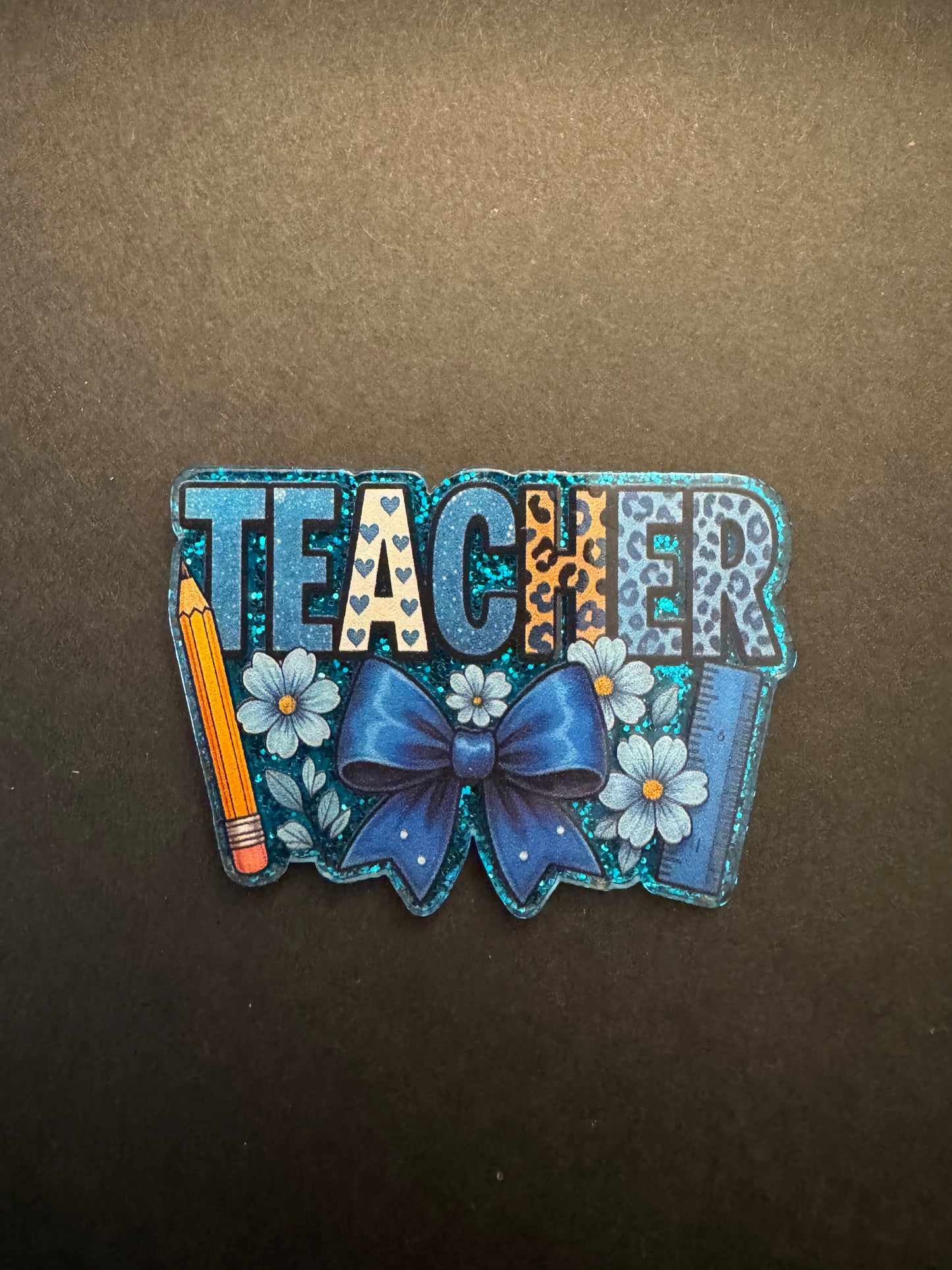 Teacher badge reel